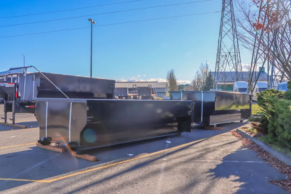 Roll-off dumpster ready for waste disposal at job site for 3 Yard Dumpster Rental in Indian River Estates